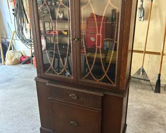 Antique China Cabinet will need some restoration. Located in Garage 