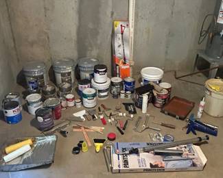 Various painting supplies. Basement location 