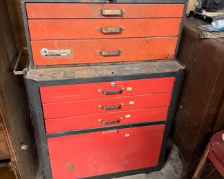 Vintage Rem Line two-piece rolling tool chest in red and black finish, showing some wear and surface rust from use.