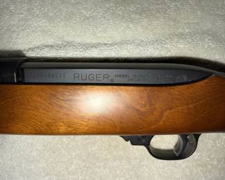 Ruger Model 10/22 Carbine .22 LR caliber rifle, showing the receiver markings, serial number, and wooden stock.