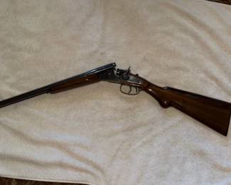 Amadeo Rossi S.A. double-barrel shotgun, imported by The Garcia Corp., featuring a blued finish and dual external hammers.