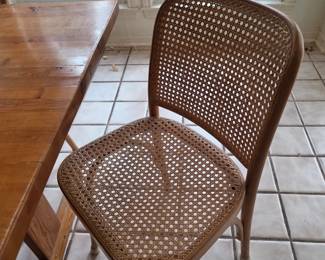 close up of rattan dining room chair
