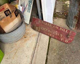 antique wooden Firehouse sign, other old signs and antique bottles