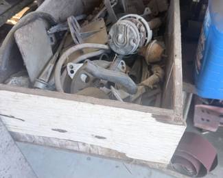 Crate of vintage auto parts — $50
