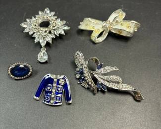Clear and Blue Colored Brooches
