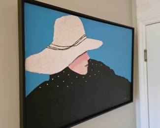 Pop art-style painting of woman in wide white hat on bright blue ground