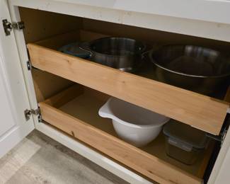 Stainless steel saucepans, large mixing bowls and food storage containers