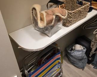 Folding striped beach chairs with shearling slippers and wicker baskets