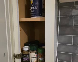 Pantry spices and seasonings with Morton salt and peppercorn jars
