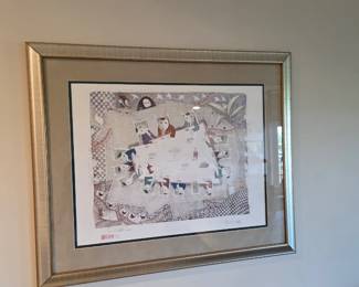 Pencil-signed whimsical print of figures and cats around a long table