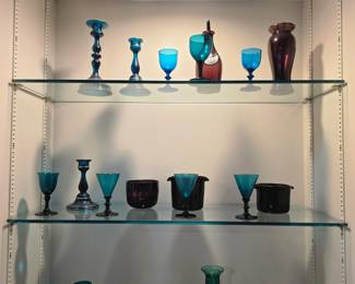 Teal blown glass candlesticks, goblets and cruet with amethyst ice buckets