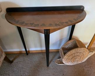 L. Hitchcock stenciled half-round console table featuring a natural wood top with stenciled leaf details