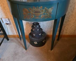 Hitchcock half-moon console table with a painted floral and fruit motif