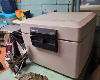 Document safe with key.