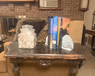 Clear jar of shells and shell bookends