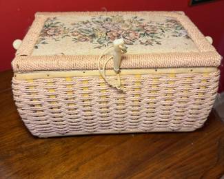 Vintage woven wicker sewing basket with sewing supplies