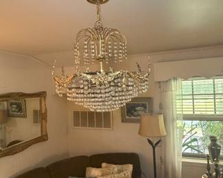 Vintage waterfall/wedding cake style crystal chandelier.  Must be able to remove yourself.