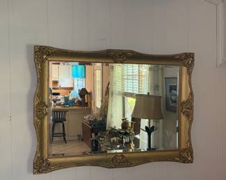 Vintage Hollywood Regency/French Baroque revival style gold-framed wall mirror