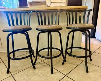 3 Counter bar stools covered in suede