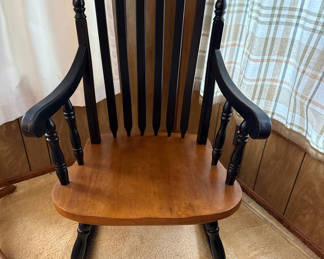 Lot 23: Black and natural wood rocking chair