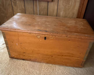 Lot 27: Wooden storage trunk with calculator and papers
