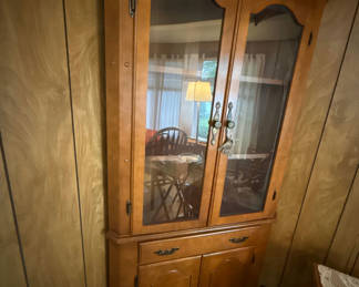 Lot 7: Corner Wooden china cabinet with glass display and lower storage