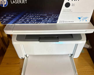 Lot 40: HP LaserJet Printer with HP 141A Black Toner Cartridge