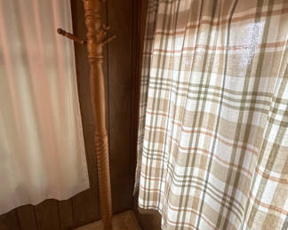 Lot 22: Wooden freestanding coat rack with multiple hooks