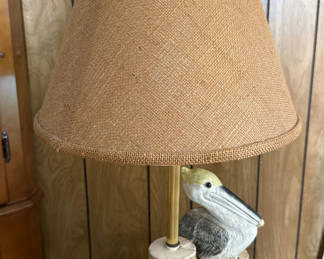 Lot 16: Pelican-themed log-base table lamp