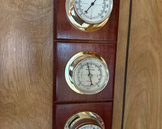 Lot 5: Wooden wall-mounted weather station with three gauges