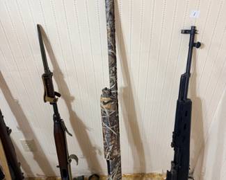 Norinco SKS, camo Mossberg 935 Magnum 12 ga (serial AM009018), M1 Carbine.