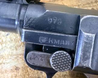 DWM Artillery Luger receiver markings: 1916 chamber date, Imperial proofs, matching 75 on small parts.