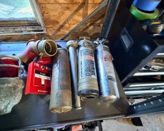 Vintage fire extinguishers and fire alarm collectibles