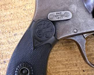 H&R top-break revolver, grip close-up.