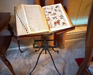 Griffin and Griffin cast iron dictionary stand, turn-of-the-century