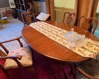 64" as shown, plus three 18" leaves, five chairs