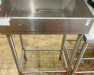 LOT # 050  -  STAINLESS STEEL STORAGE TABLE