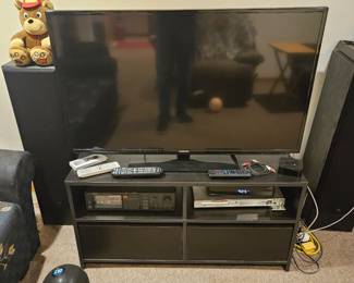 50 inch TV with stand and speakers