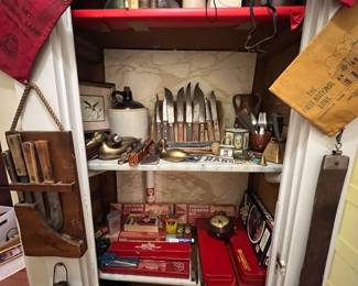 Gun related items, old knives , brass bells , vintage bank bags ,razor strap 
