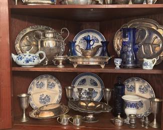 Divided blue willow plates   Silverplate candles , trays and a sterling pitcher and salt and pepper shakers 