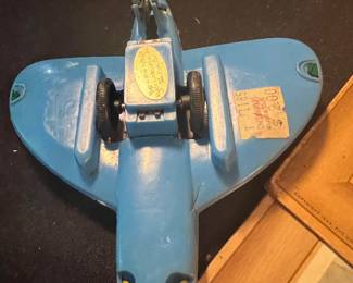 Underside of toy plane w org price tag 