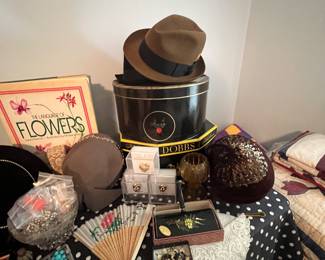 Vintage hats and hat boxes , fans and costume jewelry 
