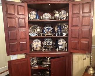 Late 1800’s walnut  corner cupboard with paneled doors 