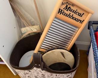 Authentic Musical Washboard and percussion instruments in a basket