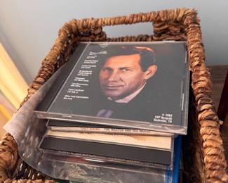 Woven basket of CDs including Chet Atkins