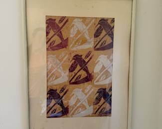 Framed abstract block print with repeating bird and leaf motifs