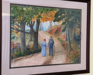 Framed watercolor of a couple walking a country lane in autumn