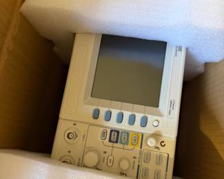 Digital oscilloscope in its original foam packaging
