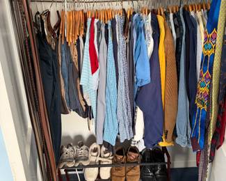 Men's closet with shirts, trousers, ties, belts, caps and shoes