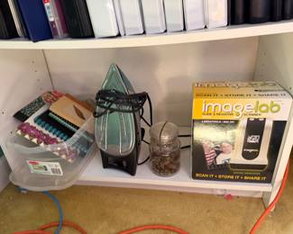 Steam iron, jar of buttons, boxed ImageLab slide and negative scanner and sewing trims